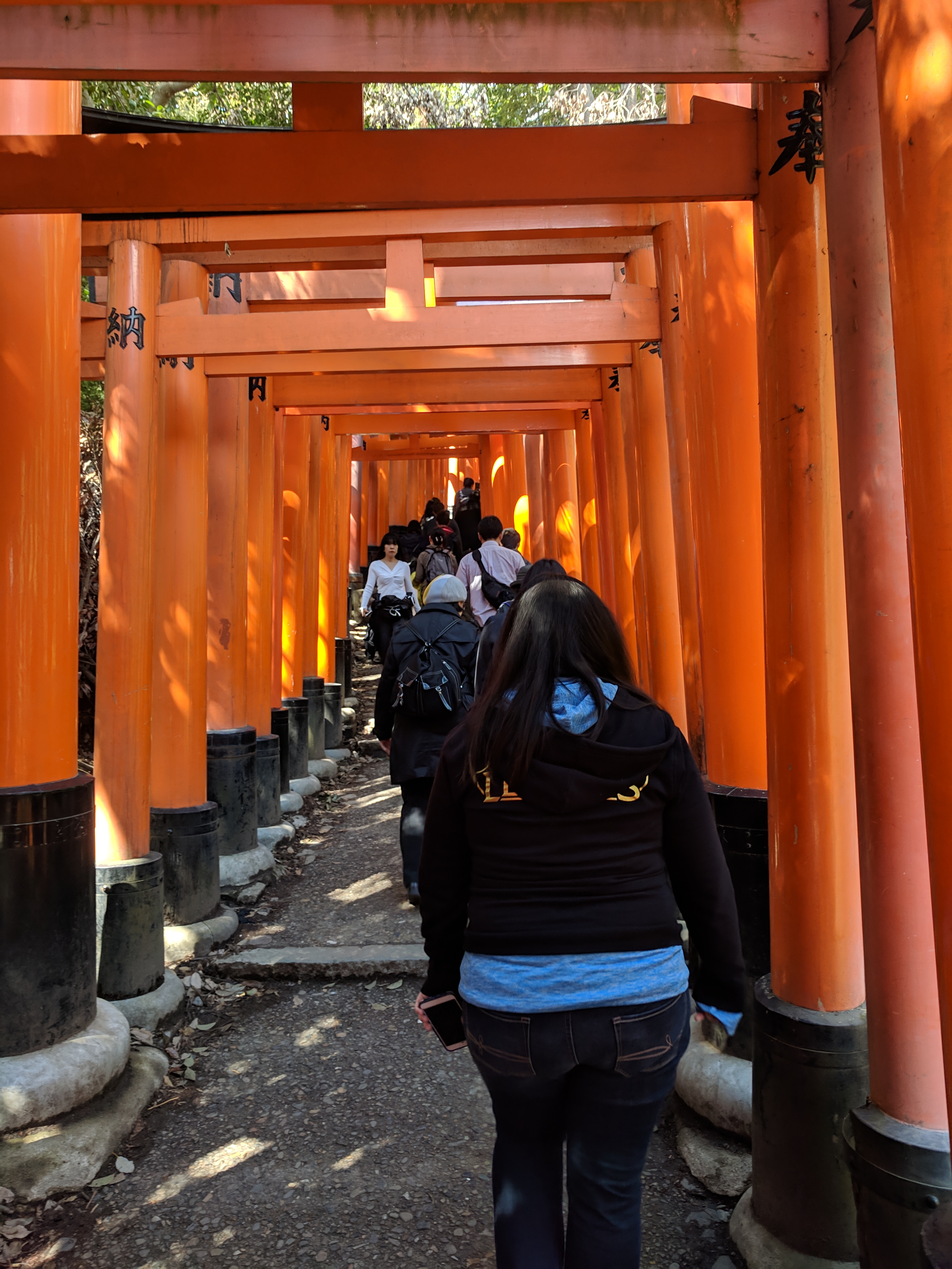 Climbing the steps of the Fushimi Inari Taisha shrine in Kyoto, Japan. © 2021 John Apostol